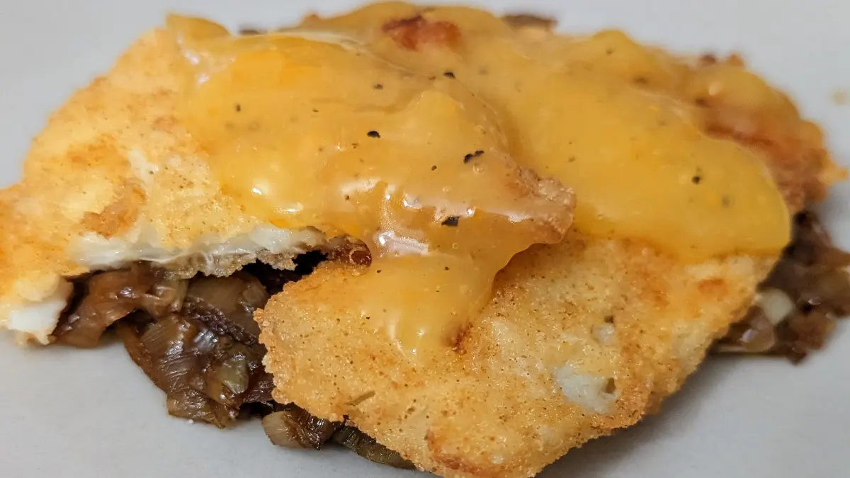Sole filets with caramelized leak and orange sauce