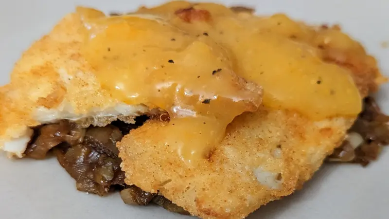 Sole filets with caramelized leak and orange sauce